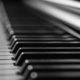 black and white photograph of piano keys