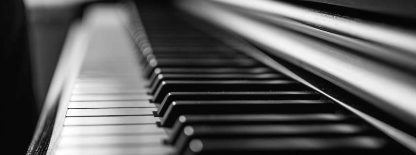 black and white photograph of piano keys